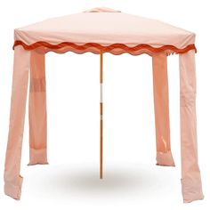 a pink tent with an orange stripe on the top and sidewalls that have scalloped edges