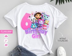 the birthday girl shirt is on display next to a pair of jeans and sneakers, along with other items