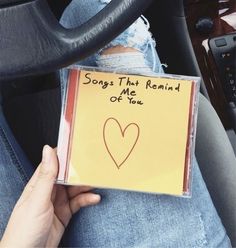 someone is holding up a note that says, songs that remind me if you love