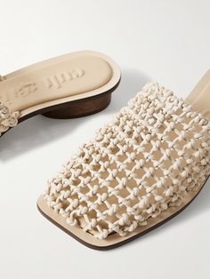 Find CULT GAIA Merida Woven Leather Mules on Editorialist. Cult Gaia's 'Merida' mules are hand-knotted from strips of smooth leather to create a crochet-like appearance. They have cushioned soles for comfort and rest on cylindrical 30mm wooden heels. Wear yours with a breezy coverup on the beach. Crochet Heels, Woven Mules, Winter Work Wear, Wooden Heels, Cold Weather Boots, Cult Gaia, Wooden Heel, Leather Mules, Fine Earrings