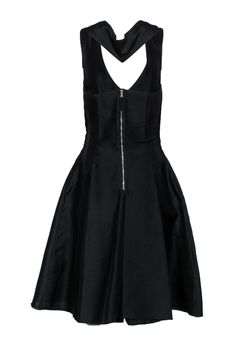 You'll be classically chic in this dress from Dolce & Gabbana! This fit and flare dress is simple yet chic, and perfect for any cocktail party or formal event. Pair with silver jewelry and a bright heel for a pop of color. Size S 70% Cotton, 30% Silk Exposed back zipper Unlined Fit and flare silhouette V-neckline Sleeveless Pockets on sides of skirt Racerback Pleat on skirt front Bust 32" Waist 28" Shoulder to hem 43" Bright Heels, Fashion Sewing, Fit And Flare Dress, Fit Flare Dress, Fit & Flare, Cocktail Party, Flare Dress, Formal Event, Fit And Flare