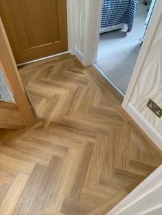 an image of a wood floor in the house that looks like it's going to be finished