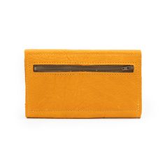 Turmeric OrangeTHE wallet. Functions like a dream, holds all you need, doubles as a clutch. Available in a myriad of colorful leather options, so you can choose the one that is perfectly you. This classic design features 6 credit card slots, a compartment for organizing bills and receipts, and a back zippered coin pocket— all in a slender silhouette. The sleeve of this wallet also holds your phone, so feel free to carry it solo anytime you feel like getting dressed up. Available in soft chrome t Orange Leather Wallet For Daily Use, Yellow Wallets With Rfid Blocking For Daily Use, Orange Rectangular Wallets With Interior Card Slots, Orange Rectangular Wallet With Interior Card Slots, Yellow Travel Coin Purse With Card Slots, Rfid Blocking Clutch Wallets For Everyday Use, Travel-friendly Yellow Coin Purse With Card Slots, Everyday Clutch Wallet With Card Slots, Everyday Orange Leather Wallet