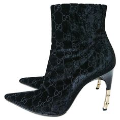 Brand New and Super Rare Gucci by Tom Ford Black Velvet Ankle Boots. Designer size US 6.5 B - European 36.5 B GG Velvet Monogram "Guccissima" Ankle Boots Featuring the Iconic Bamboo Style Heel in Gold-Tone. Pointed Toe, Zip Closure, Padded Calfskin Insoles, Satin Lined Interior. Heel Height - 4 inches ( 10 cm ). Made in Italy. New without box. Listing code: 11202054580419958 Tom Ford Heels, Tom Ford For Gucci, Tom Ford Gucci, Black High Heel Sandals, Gladiator Boots, Velvet Ankle Boots, Beaded Shoes, Gucci Heels, Gucci Outfits