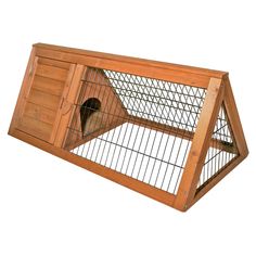 a large wooden bird cage with two doors and one door open on the outside side