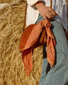 We created these bandanas in collaboration with Block Shop Textiles to be reminiscent of classic western bandanas. Our goal was to create a modern take on a timeless accessory as old as ranching itself. The end result is a simple daily essential that we know you will cherish for decades to come. Traditional Bandana For Festival, Retro Summer Festival Bandana, Brown Bandana Print Bandana For Festivals, Brown Bandana With Bandana Print For Festival, Festival Brown Bandana With Bandana Print, Vintage Bandana Scarf For Summer, Vintage Summer Bandana Scarf, Retro Adjustable Bandana For Summer, Bohemian Brown Bandana For Festival