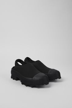 Traktori  by Camper Modern Outdoor Sandals With Rubber Sole, Black Sandals With Textured Sole For Outdoor, Black Slides With Textured Sole For Outdoor, Black Slip-on Sandals With Vibram Sole, Black Slingback Mules With Rubber Sole, Modern Outdoor Clogs With Rubber Sole, Black Clogs, Camper Shoes, Ballerina Shoes Flats