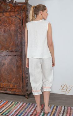 "Pure linen pajama set for women - decorated with contrast linen colored tapes Pajama top sleeveless, with nice shaped V-neck form and curved cut lines at bust with gatthering. Contrast linen binding at front bust curved seams and nice small bow at neck line bottom Shirt center back length - 56cm (22\") Trouser with elasticated waist and contrast linen tape at trouser bottom gathering line. Small contrast bow - only on left side leg at contrast tape. Trouser inside seam length - 50cm (19.7\") Pa White Sleeveless Loungewear Sets, White Long Pants Sets For Daywear, White Vacation Sets With Long Pants, White Linen Beach Sets, White Linen Loungewear Sets, White Matching Set Sleepwear For Vacation, White Sleepwear Matching Set For Vacation, Linen Pajama Set, Linen Sleepwear