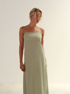 The chic, simple and timeless dress for any occasion, summer date night or wedding. This mid-length, form-fitting satin dress has adjustable spaghetti straps and a square neckline that gives off 90s minimalism vibes with a modern twist. 97% Polyester, 3% Spandex Fits True to Size Fitted Slip Dress With Tie Straps And Square Neck, Fitted Square Neck Slip Dress, Square Neck Strapped Sundress Midi Dress, Solid Color Square Neck Midi Sundress, Solid Satin Slip Dress, Midi Length, Vintage Lifestyle, Summer Dates, Timeless Dress, Lifestyle Art