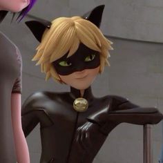 the animated characters are dressed in black cats and catwoman costumes, with green eyes