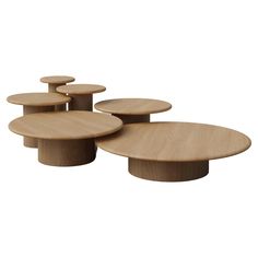 three wooden tables sitting on top of each other