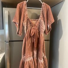 Size Medium. Never Worn. Tags Have Been Removed. Would Fit A Medium Or Large. Bow In The Back Is Adjustable. Chic Mauve Short Sleeve Dress, Mauve V-neck Dress For Date Night, Casual Mauve V-neck Dress, Free People Velvet, Ethiopian Opal Ring, Velvet Mini Dress, Large Bow, Mini Velvet Dress, Free People Dresses