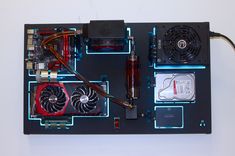 the inside of a computer motherboard with fan, heats and other components on it