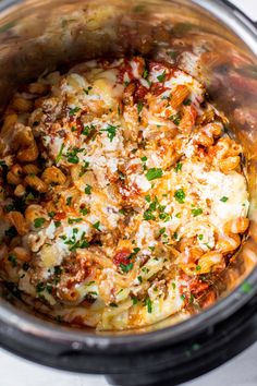 the food is prepared and ready to be cooked in the crock pot for dinner