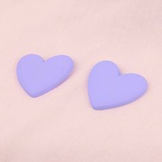 The perfect shade of bright lavender to capture spring vibes and match all your early 90's prints. Heart-shaped stud earrings in a fun puffy type of acrylic that looks a bit like polymer clay but is lighter weight so won't weigh down your ears. 1.37 inches (3.5 cm) long and 1.57 inches (4 cm) wide Stainless steel studs Lightweight matte finish acrylic (looks and feels a bit like polymer clay, but lighter weight) Heart Stud Earrings, Spring Vibes, Bright Purple, Heart Studs, Heart Earrings Studs, Big Heart, Light Purple, Polymer Clay, Lavender