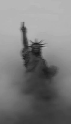 a blurry photo of the statue of liberty