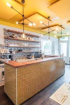 the kitchen is clean and ready for customers to use it's counter top area