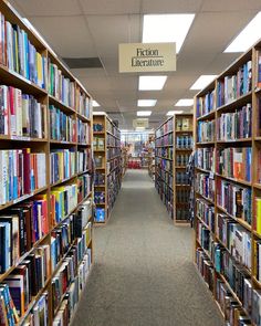 a library filled with lots of books next to each other