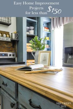 a kitchen island with an open book on it and the words easy home improvement projects $ 350 for less than $ 500