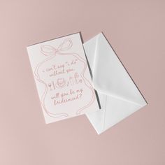 an envelope with a card inside on a pink surface next to a white envelope that says, can't say i do without you will you be my husband?