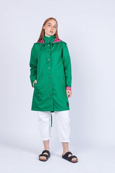 "Women's Green Fashion Unique Raincoat \"GUATEMALA\" 084 Handmade in Lithuania.  Enjoy functional and stylish raincoat. This raincoat is waterproof and wind-resistant to keep you warm and dry.  Raincoat is with a hood and has front pockets with buttons. Color: green Material: 100% Polyester, coated with PU Lining: 100% Rayon, dark pink color Size: XS, S, M, L, XL, XXL Precise raincoat size (cm/inch) You can find in photos area." Green Waterproof Windbreaker For Spring, Waterproof Long Coat Raincoat For Spring, Spring Green Waterproof Windbreaker, Spring Waterproof Green Windbreaker, Waterproof Long Raincoat For Spring, Fall Weatherproof Green Windbreaker, Green Windbreaker For Fall, Green Weatherproof Windbreaker For Spring, Spring Waterproof Nylon Raincoat