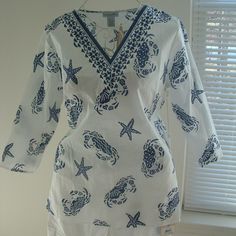 Gorgous Caribbean Joe Top Can Be Worn As Just A Blouse Top, Or As A Beach Cover!! Lightweight Cotton White With Navy, Sea Garden Motif Print V-Neck, 3/4 Sleeve Size L. Underarm To Underarm: 22” Inches, Top Of Back Shoulder To Bottom Hem 28” Inches Bnwt Cleaning Out My Closets From A Smoke Free Home Cotton V-neck Blouse For Beach Season, Summer 3/4 Sleeve Blouse For Beach, Summer Blouse For Beach With 3/4 Sleeves, White 3/4 Sleeve Blouse For Vacation, Summer Blouse With 3/4 Sleeves For Beach, Beachy White V-neck Top, White 3/4 Sleeve Tops For Vacation, Blue V-neck Beachy Top, Fitted Beach Top With 3/4 Sleeves