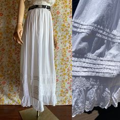 Antique skirt with adorable details: stitched stripes and eyelet ruffle. All cotton. Gathered on the waist, maxi length. The closure on the waist belt is missing. The waist size is tiny, but it's possible to attach laces and wear it with open closure (like shown on mannequin). DETAILS: Brand: no label Composition: no label, 100% Cotton Lining: none Size: no label, the waist is tiny (see measurements, dress form is US 4) Very good vintage condition MEASUREMENTS: Waist: 22.25''/56.5 cm Hips: free Waist-length Bottoms For Summer Daywear, White Ruffled Maxi Bottoms, White Ruffled Maxi Length Bottoms, Daywear Ruffled Petticoat, Daywear Tiered Skirt Petticoat With Ruffles, Daywear Ruffled Tiered Skirt Petticoat, Daywear Tiered Petticoat With Ruffles, Spring Cotton Maxi Skirt With Lace Trim, Summer Maxi Length Bottoms With Lace Trim