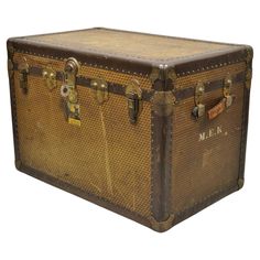 Antique Belber Traveling Goods Monogram Louis Style Hard Case Steamer Trunk. Item features a unique geometric monogram print throughout similar to LV, metal hardware, leather handles, lift out insert, original label, working lock and key, very nice antique item, quality American craftsmanship. Circa Early 20th Century. Measurements: 22.5" H x 32.5" W x 20.25" D. Trunk Boxes, Leather Trunk, Travel Trunk, Steamer Trunk, Leather Frames, Bespoke Interiors, Game Ideas, Monogram Prints, Lock And Key