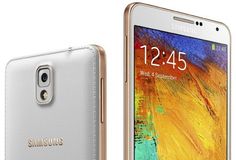 the samsung note 3 is shown in gold and silver