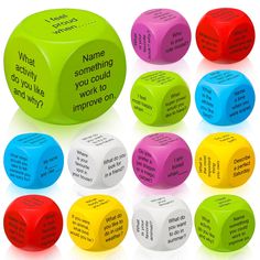 several different colored dices with words written on them