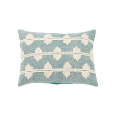 a blue and white pillow with hearts on it