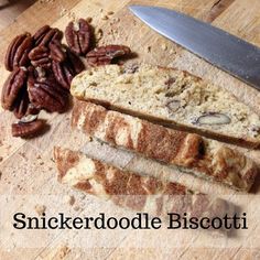 sliced bread and pecans on a cutting board with the words snickkerdoodle biscotti