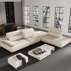 a modern living room with white furniture and large windows in the backround area