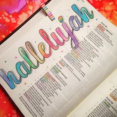 an open bible with colorful lettering that reads,'beautiful'and the words below it