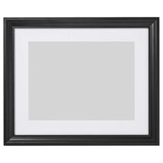 a black and white frame on a wall with a light gray area in the middle