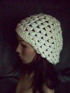 This hat was crocheted  with a yarn that is 12% acrylic, 2% polyester and 86% bamboo.  The hats color is call linen.  It has a relaxed circumference of 20 inches and a stretched circumference of 22 inches.  This hat is soft, cozy and warm just in time for the cup coming winter months.  I would suggest it to be washed by hand and lay flat to dry. If you have any question please contact me. Shipping: I will ship outside of the continental United States. Just email me your location and I will gladl White Winter Hat, Crochet White, Bamboo Yarn, Skull Cap Beanie, Pretty Gift, Vintage Avon, White Crochet, Winter Months, Winter Hat