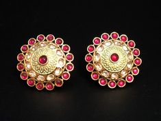 "Meenakari Kundan stud earrings,Sabyasachi Kundan studs,Jadau kundan stud earrings,Meenakari earrings,Kundan wedding jewelry@AryaFashions Beautiful high quality Traditional Indian Wedding earrings with Kundan, Stones and Meena work. Very beautiful and attractive, These sophisticated glittering earrings have high-end Kundan stones in Meena setting. Features - Traditional Kundan/Polki/Meenakari earrings pair - Handcrafted To Perfection - Unique boutique design - Perfect for Indian Weddings and Cel Temple Jewelry Earrings With Zari Work For Party, Party Temple Jewelry Earrings With Zari Work, Temple Jewelry Earrings With Motifs, Round Kundan Earrings With Zari Work, Kundan Earrings With Zari Work, Navratri Gift Earrings With Zari Work, Red Zari Work Earrings For Diwali, Gold Temple Jewelry Earrings With Motifs, Temple Jewelry Style Gold Earrings With Motifs