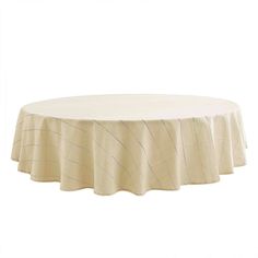 a round table with a white cloth on it