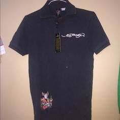 Brand New Ed Hardy Short Sleeve Polo Shirt With Tags. Has A Small Hole Near The Back Of The Collar But Is Brand New And Never Been Worn. Casual Polo Collar Top With Graphic Print, Fitted Polo Collar Shirt With Graphic Print, Fitted Polo Shirt With Graphic Print, Fitted Graphic Print Collared Tops, Fitted Graphic Print Tops With Collar, Hardy Shirts, Polo Shirt Colors, Fit Ideas, Ed Hardy