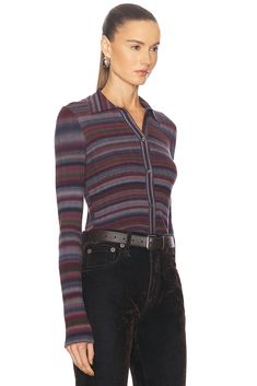 Find RE/DONE Ribbed Polo Cardigan In Lavender on Editorialist. RE/DONE Ribbed Polo Cardigan in Lavender 100% wool. Made in China. Hand wash. Front button closure. Ribbed knit fabric. REDR-WS268. 658-10WLSPCAR. About the designer: Using material salvaged from previously owned Levi’s® products, RE/DONE reconstructs each pair of denim right in their downtown Los Angeles studio. The process of handpicking and tailoring each pair into a modern fit ensures no two are alike establishing individuality w Fitted Merino Wool Sweater With Button Closure, Fitted Ribbed Wool Cardigan, Fitted Merino Wool Cardigan With Buttons, Fitted Purple Cardigan For Layering, Fitted Purple Cardigan With Buttons, Polo Cardigan, Levi’s Jeans, Vintage Character, Downtown Los Angeles