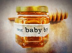 a honey jar with a label that says, sweet baby boy