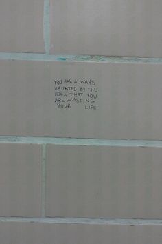 a white brick wall with writing on it that says, you are always in the right place