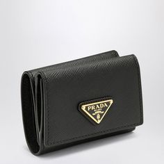 Black Saffiano Leather Small Wallet From Prada Featuring A Snap Button Closure, An Enamelled Metal Triangle Logo, A Banknote Compartment, Three Card Slots And An External Coin Pocket With Flap. Width 8 Cm X Height 10 Cm X Depth 2 Cm Size Type: Int Material: Leather Sku: 2f-1mh042qhh/P_prada-F0002_100 Welcome To The Official Luosophy Poshmark Closet! Luosophy Is A Luxury Brand Reselling Company Founded In San Diego, Ca From 2016. All Our Products Are Imported From Italy And Sold In The Usa. We Do Elegant Bifold Wallet With Gold-tone Logo Plaque, Black Evening Wallet With Logo Plaque, Designer Black Saffiano Leather Wallets, Luxury Saffiano Leather Wallet For Evening, Elegant Saffiano Leather Bifold Wallet, Classic Black Saffiano Leather Wallet, Elegant Saffiano Leather Business Wallet, Elegant Saffiano Leather Wallet With Card Slots, Elegant Evening Wallet In Saffiano Leather