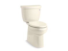 a white toilet sitting on top of a white floor