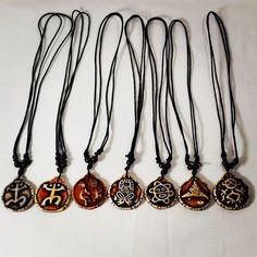 Double-sided Taino Symbols Adjustable Necklaces Festival Pendant Necklace With Adjustable Cord, Assorted Adjustable Spiritual Jewelry, Brown Pendant Jewelry For The Beach, Brown Pendant Jewelry For Beach, Symbolic Brown Pendant Necklace, Vintage Necklace With Adjustable Cord For Festivals, Adjustable Medallion Amulet Necklaces, Adjustable Medallion Necklace In Amulet Style, Handmade Adjustable Amulet Charm Necklaces