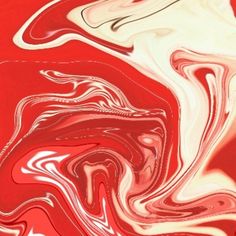 an abstract painting with red and pink colors on it's surface, as well as white