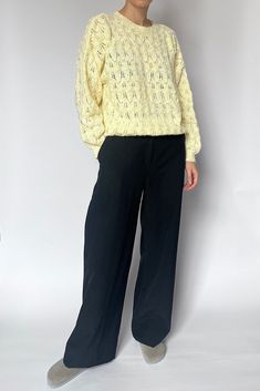 Vintage hand knitted jumper in a soft, pastel yellow. Hand knitted in an open knit and a timeless texture. Features a dropped shoulder, volume sleeve and a rib neck, hem and cuff. Size S/M / UK 8-12 / EU 36-40 / US 4-8. Model is size UK 6-8 and 5'4 and it has a relaxed fit.  Length: 58cm / Bust circ: 53cm / Sleeve Length: 45cm Great condition. There is one very small section where the knit has a slightly textured section. Sourced in Germany. This item is based in London. Yellow Pointelle Knit Sweater For Winter, Yellow Long Sleeve Pointelle Knit Sweater, Chic Yellow Sweater, Blue Suede Jacket, Yellow Jumper, Hand Knitted Jumpers, Spring Yellow, Split Hem Dress, Winter Quilts