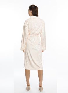 Indulge in ultimate Bliss with our Rose Gold Long Robe. Adorned with delicate peachy-rose blossoms, this luxurious and absorbent robe is perfect for post-shower relaxation or lounging. Feel like royalty in this must-have addition to your self-care routine. One size Long bath/lounge Robe Shawl collar 2 bottom side pockets Belt loops/removable waist tie closure Made of soft and absorbent microfiber Machine wash cool Tumble-dry low Elegant White Lounging Robe, Feminine Cream Robe For Loungewear, Long Bath, Lounge Robes, Self Care Routine, Shawl Collar, Care Routine, Waist Tie, Feel Like