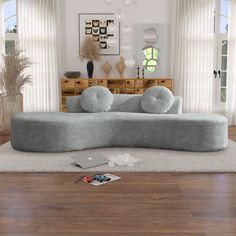 a couch sitting on top of a hard wood floor