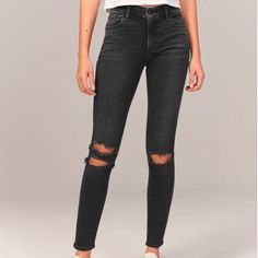 Abercrombie & Fitch's Mid Rise Super Skinny Jeans With Built-In Stretch Will Become Your Everyday Go-To Style. - Color: Black Ripped Wash - Size: **2 Options For Sale**: 35 Regular And 36 Regular This Jean Sits Right Below The Waist And Looks Great With Your Shirt Tucked Or Untucked. With Refined Details And A Form-Fitting Silhouette From Top To Bottom, The Ankle Fit Is Cropped To Show Off Your Favorite Shoes. Features A Black Wash, Knee Blowout Details And Frayed Hem. - Materials: Body:93% Cott Spring Fitted Washed Black Jeans, Edgy Cropped Leg Jeans For Fall, Edgy Mid-rise Jeans For Fall, Edgy Cropped Jeans For Fall, Ripped Washed Black Bottoms For Fall, Washed Black Ripped Bottoms For Fall, Fall Ripped Washed Black Bottoms, Mid-rise Distressed Bottoms For Fall, Edgy Cropped Leg Bottoms For Fall